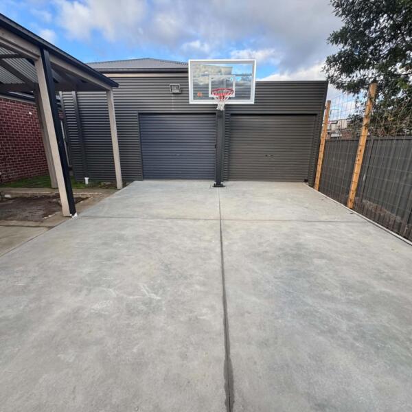 Before photo of backyard area prepared for Slam Man court installation in Ballarat