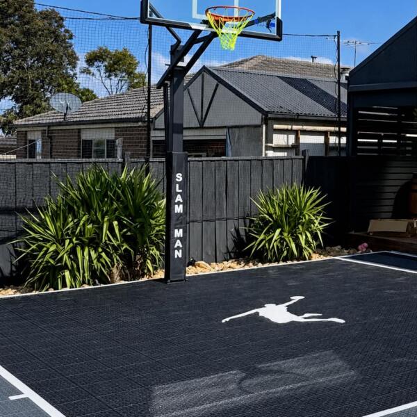 Slam Man Elite 60 inch in-ground basketball ring installed with backyard court in Melton