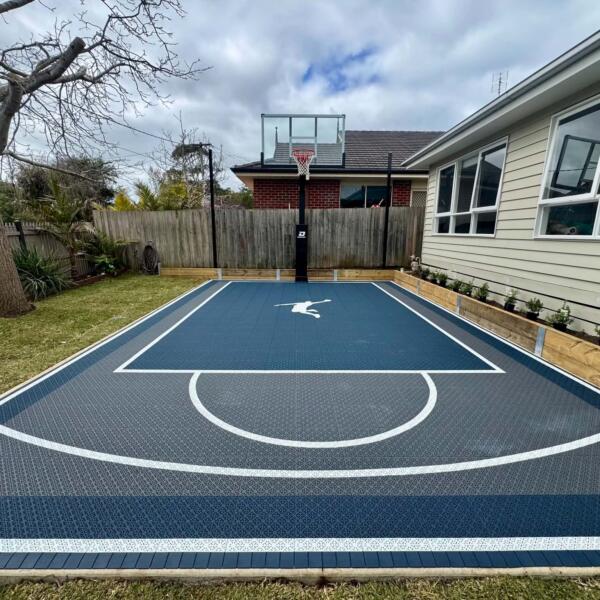Custom 5.44m x 8.2m Slam Man basketball court in Ocean Grove with premium modular sports tiles