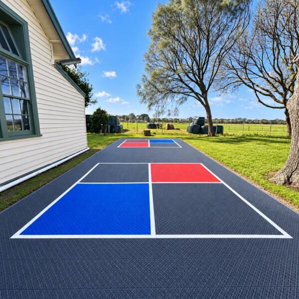 Custom school 4 square court installation in Welshpool using Slam Man Pro Cushion modular tiles