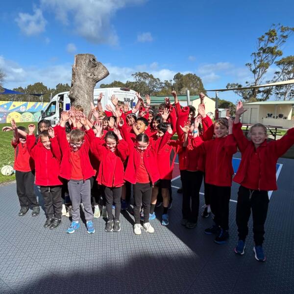 Welshpool and District Primary School students celebrating their new Slam Man 4 square courts